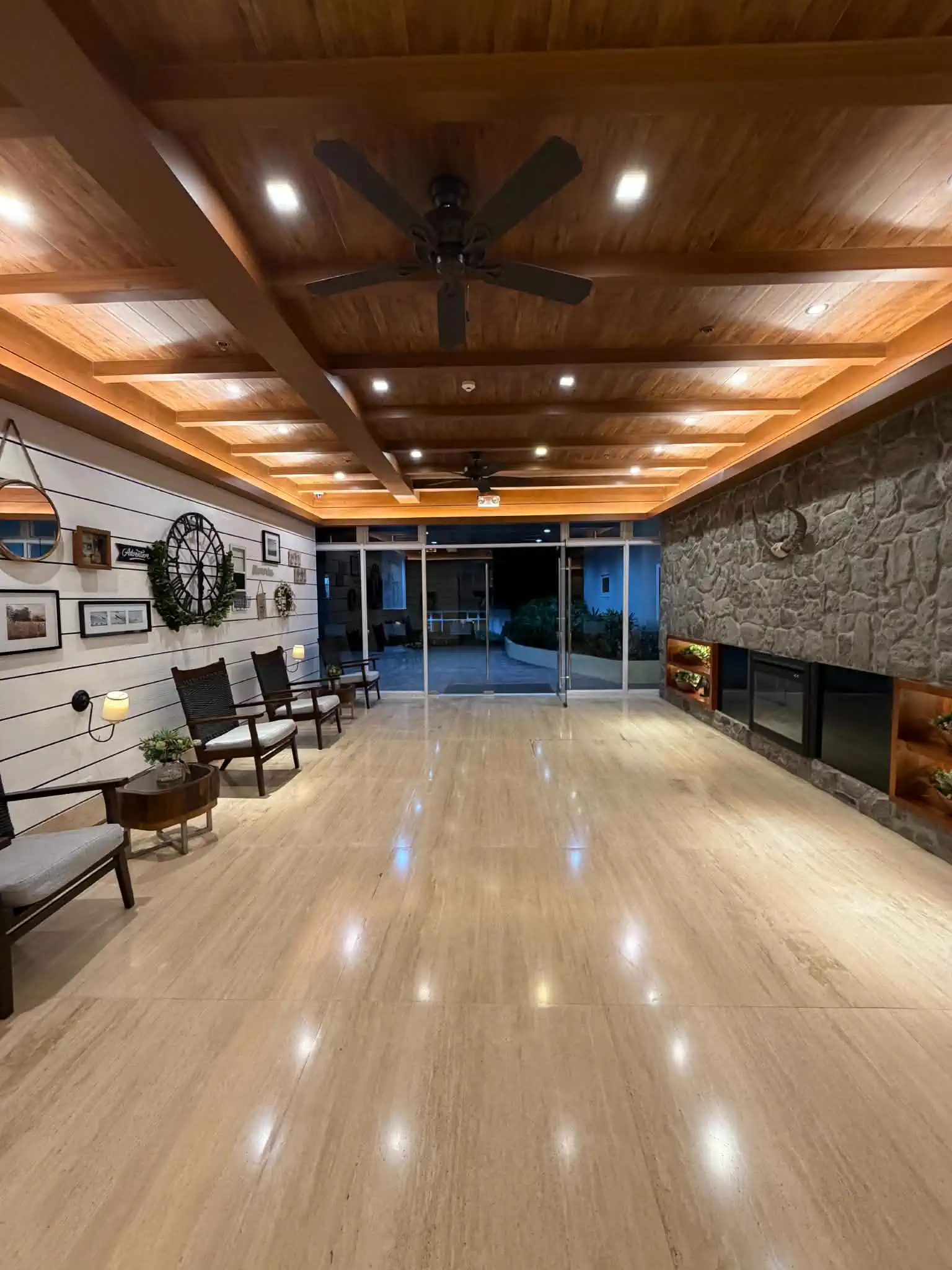 Shared lounge with fireplace at Wind Residences