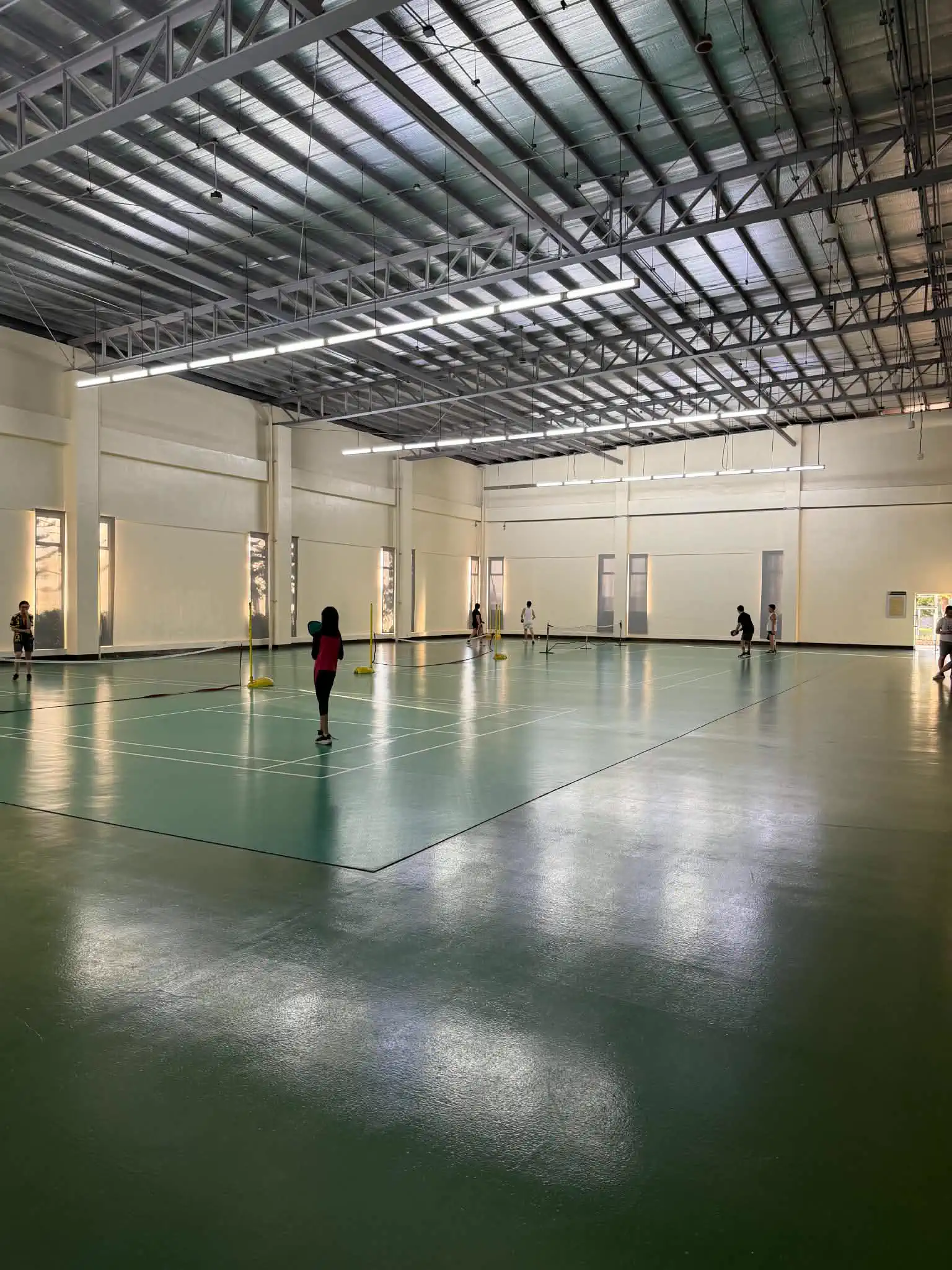 Indoor badminton courts at Wind Residences