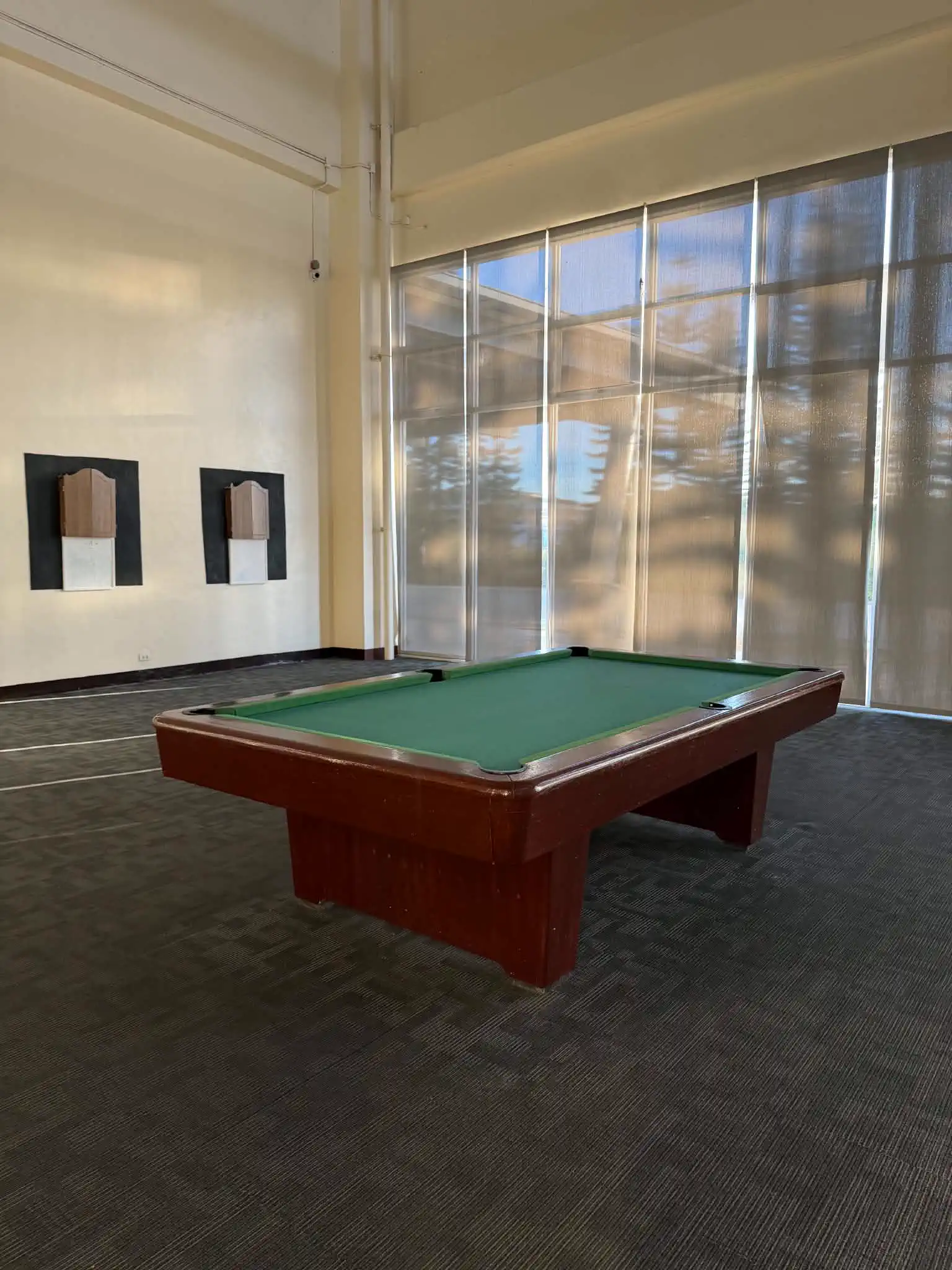 Billiards table inside the recreation hall at Wind Residences