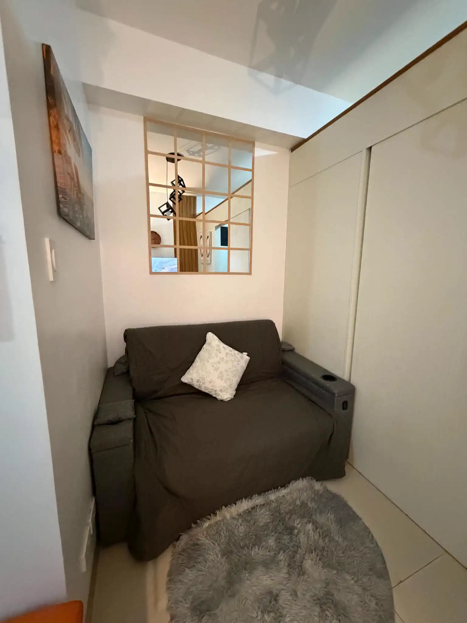 Sofa bed and seating area at Estudio Fresco