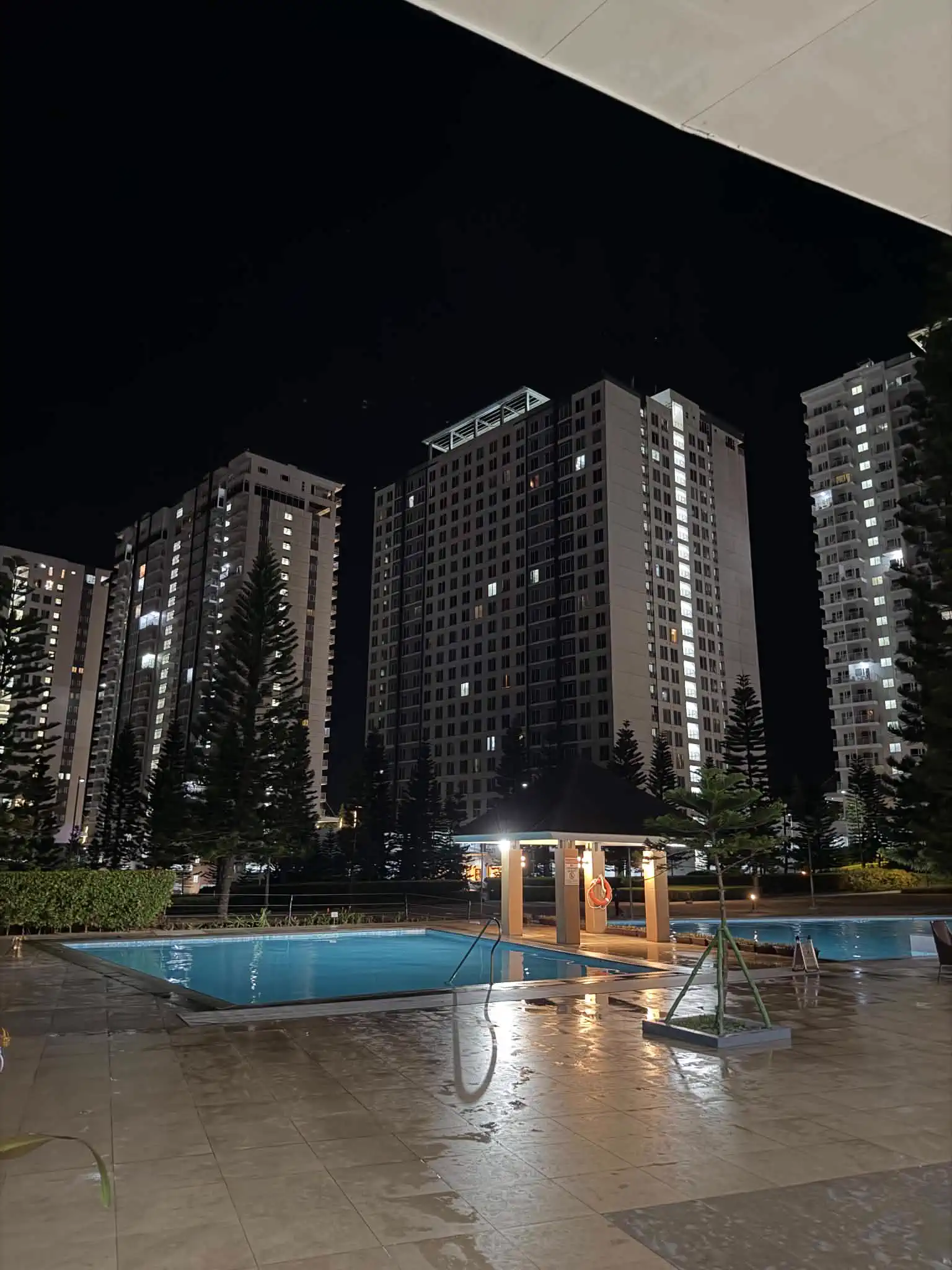 Wind Residences swimming pools and towers at night